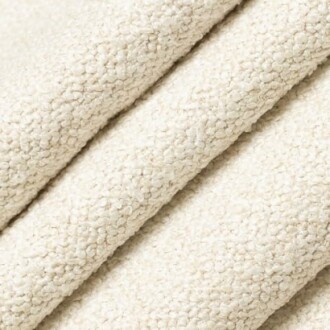 Close-up of beige towel fabric with a textured surface