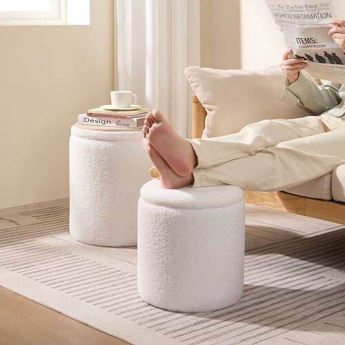 Person relaxing with feet on white footstool, reading newspaper in cozy living room.