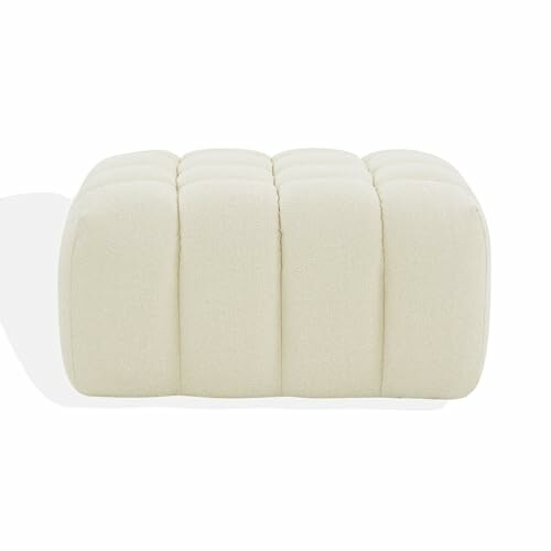 Cream fabric ottoman with tufted design