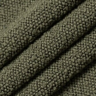 Close-up of green fleece fabric texture.