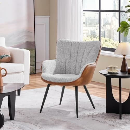 Modern accent chair in a stylish living room setting with a beautiful coffee table and a bookshelf.