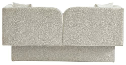 Back view of a modern beige sofa.