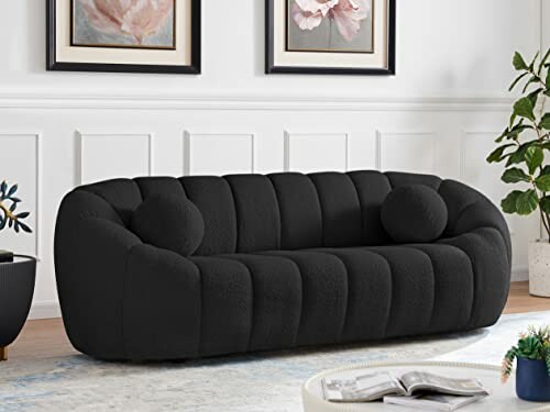 Modern black sofa in a stylish living room