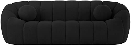 Modern black sofa with rounded cushions