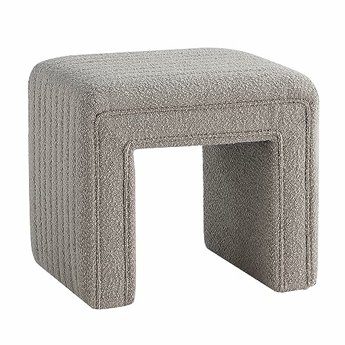 Modern gray upholstered stool with a minimalist design