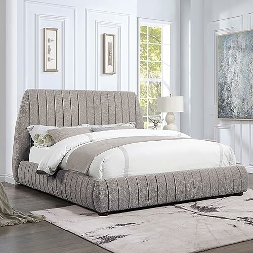 Modern upholstered bed in a bright bedroom with decor.