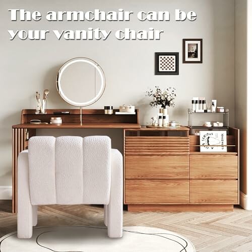 Modern vanity setup with armchair and wooden dresser.