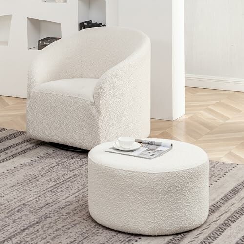 Modern white armchair and ottoman in a minimalist room.