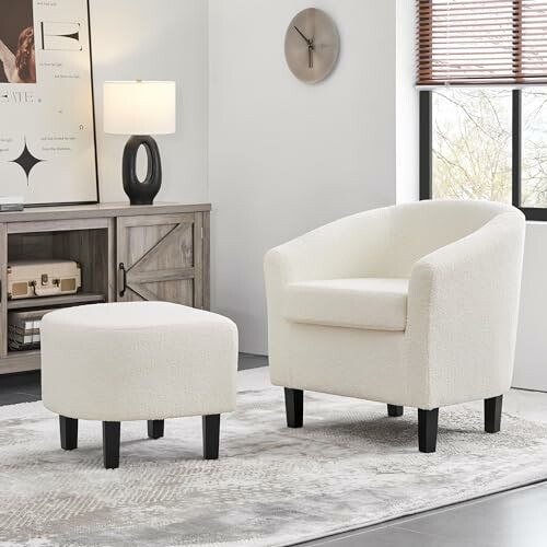 Modern white chair and ottoman in a stylish living room.