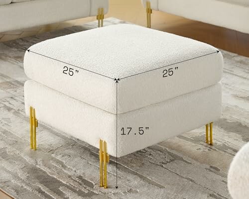 Modern white ottoman with gold legs and dimensions labeled.