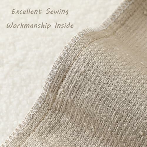 Close-up view of sewing workmanship on fabric.