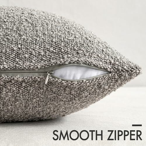 Textured pillow with smooth zipper partially open